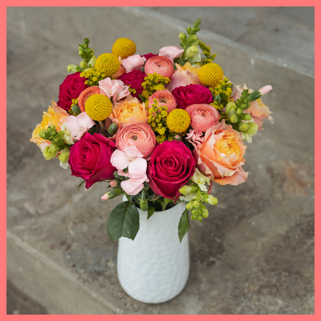 The Birthday Wish bouquet includes mixed stems of ranunculus, roses, solidago, snapdragons, solomio, and craspedia. Please note that as flowers are a live product, colors and varieties may slightly vary from the photos shown to provide you with the freshest and most beautiful bouquet.
