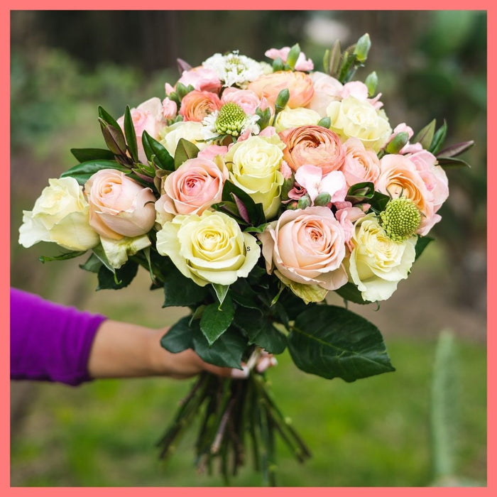 Order the Bright and Toasty flower bouquet! The Bright and Toasty bouquet includes mixed stems of roses, ranunculus, scabiosa, solomio, and hebes. The flowers will be shipped directly from the farm to you!