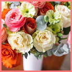 Order the Pretty and Festive flower bouquet! The Pretty and Festive bouquet includes mixed stems of roses, ranunculus, scabiosa, solomio, and eucalyptus. The flowers will be shipped directly from the farm to you!
