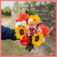 The Sunkissed bouquet includes mixed stems of ranunculus, sunflowers, roses, spray roses, alstroemeria, solomio, scabiosa, and hebes. Scabiosa only included in Lux and Premier sizes. Please note that as flowers are a live product, colors and varieties may slightly vary from the photos shown to provide you with the freshest and most beautiful bouquet.