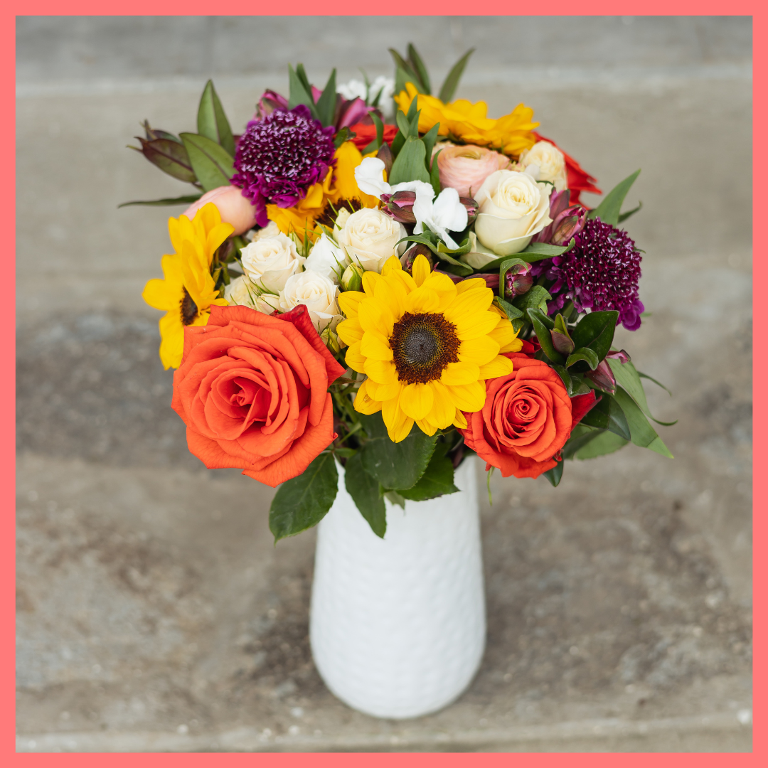 The Sunkissed bouquet includes mixed stems of ranunculus, sunflowers, roses, spray roses, alstroemeria, solomio, scabiosa, and hebes. Scabiosa only included in Lux and Premier sizes. Please note that as flowers are a live product, colors and varieties may slightly vary from the photos shown to provide you with the freshest and most beautiful bouquet.