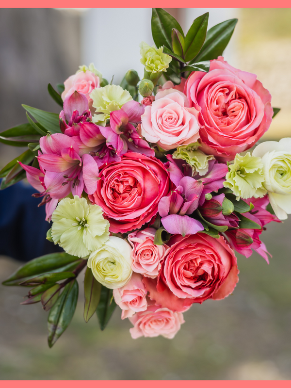 Order the Thinking of You flower bouquet! The Thinking of You bouquet includes mixed stems of roses, spray roses, solomio, alstroemeria, and ranunculus. The flowers will be shipped directly from the farm to you!