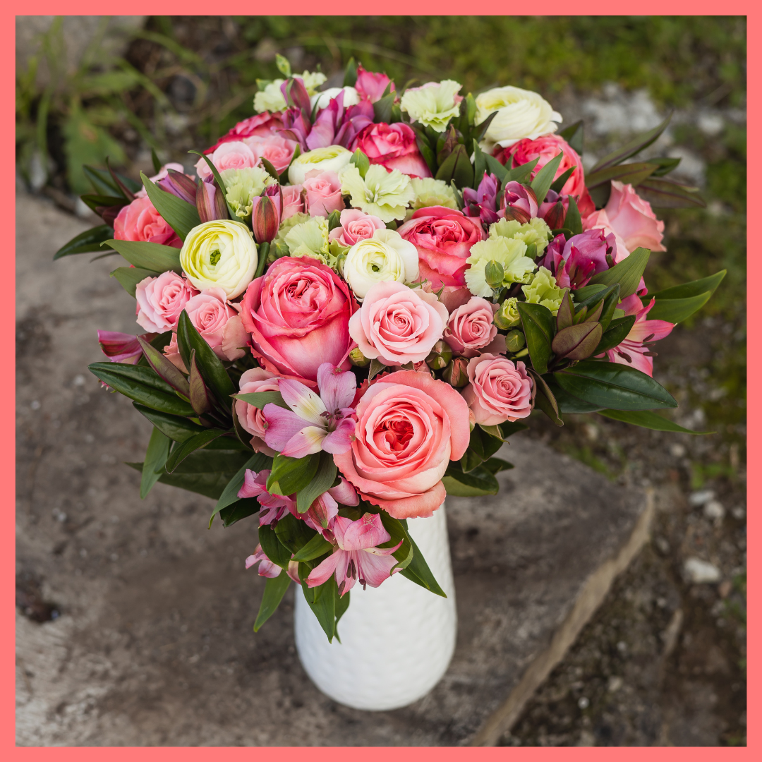 Order the Thinking of You flower bouquet! The Thinking of You bouquet includes mixed stems of roses, spray roses, solomio, alstroemeria, and ranunculus. The flowers will be shipped directly from the farm to you!