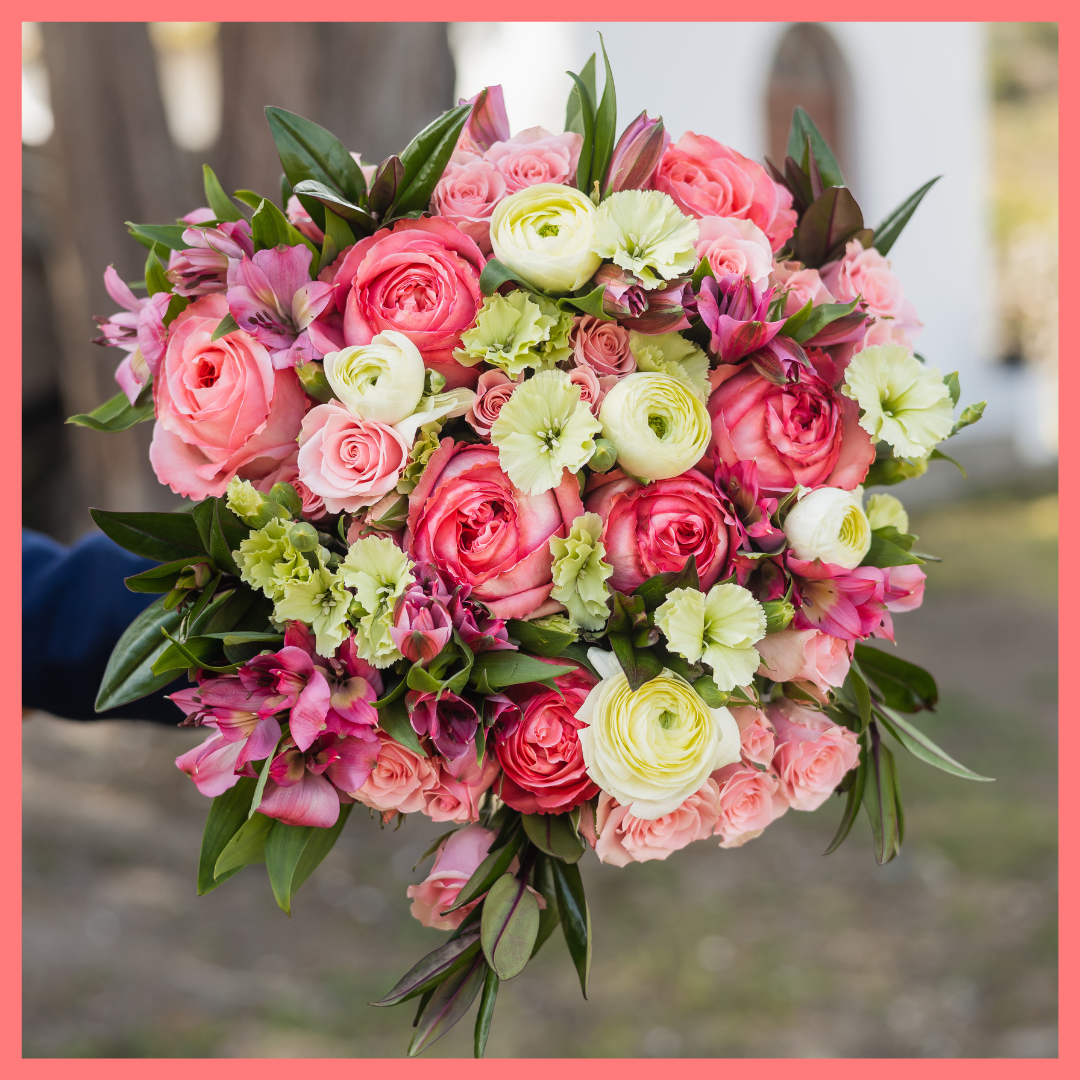 Order the Thinking of You flower bouquet! The Thinking of You bouquet includes mixed stems of roses, spray roses, solomio, alstroemeria, and ranunculus. The flowers will be shipped directly from the farm to you!