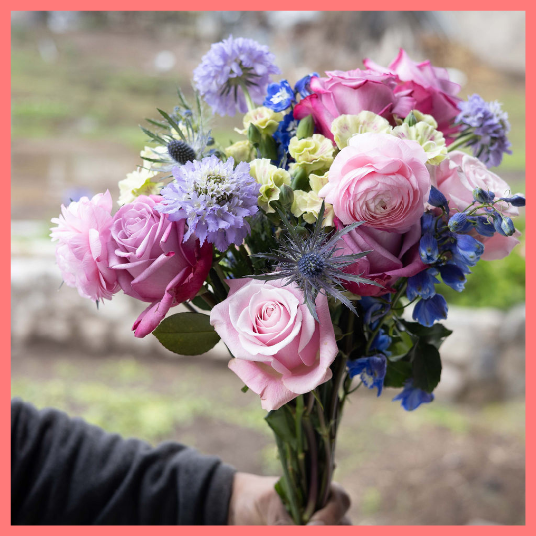 The Very Peri Pretty flower bouquet includes mixed stems of ranunculus, roses, eryngium, solomio, scabiosa, and delphinium.  Please note that as flowers are a live product, colors and varieties may slightly vary from the photos shown to provide you with the freshest and most beautiful bouquet.